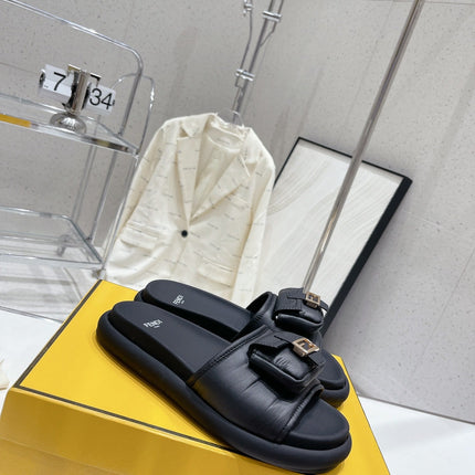 FENDI BAGUETTE SLIPPERS IN BLACK LAMBSKIN WITH GOLD HARDWARE