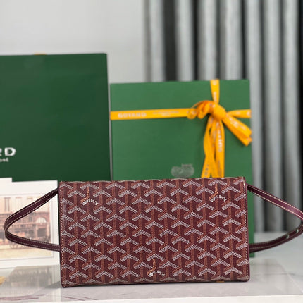 MONTE-CARLO PM CLUTCH 25 IN WINE RED GOYARDINE CANVAS