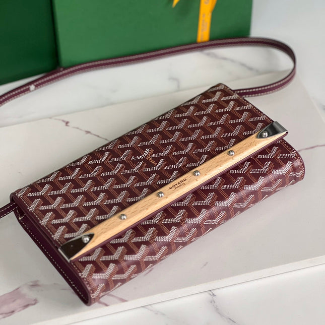 MONTE-CARLO PM CLUTCH 25 IN WINE RED GOYARDINE CANVAS