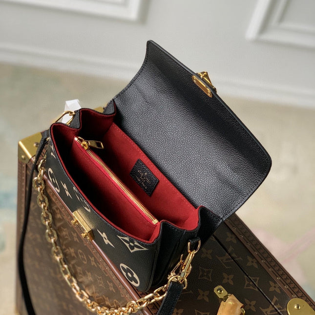 POCHETTE MÉTIS EAST WEST 21 IN BLACK AND BEIGE MONOGRAM EMPREINTE CALFSKIN EMBOSSED LOGO