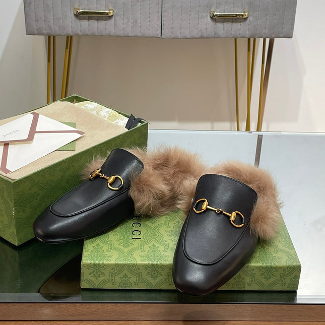 HORSEBIT MULE IN BLACK CALFSKIN AND LAMB WOOL LINING