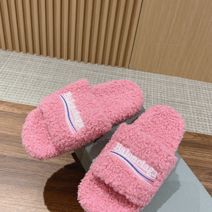 FURRY SLIDES IN PINK CURLY SHEARLING