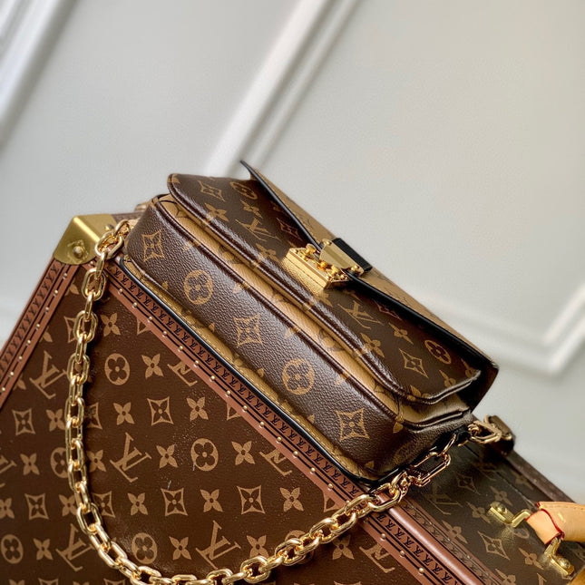 POCHETTE MÉTIS EAST WEST 21.5 IN BROWN MONOGRAM COATED CANVAS AND CALFSKIN