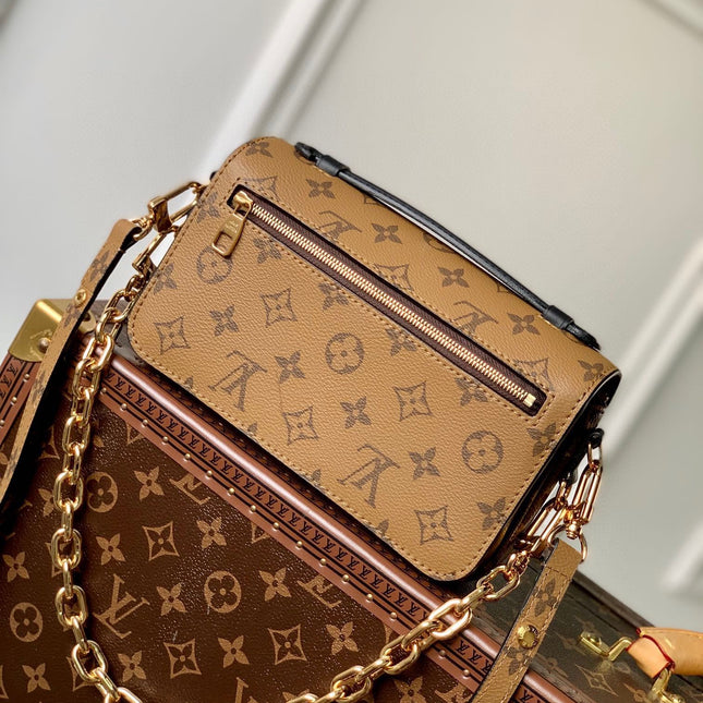 POCHETTE MÉTIS EAST WEST 21.5 IN BROWN MONOGRAM COATED CANVAS AND CALFSKIN