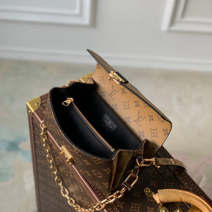POCHETTE MÉTIS EAST WEST 21.5 IN BROWN MONOGRAM COATED CANVAS AND CALFSKIN