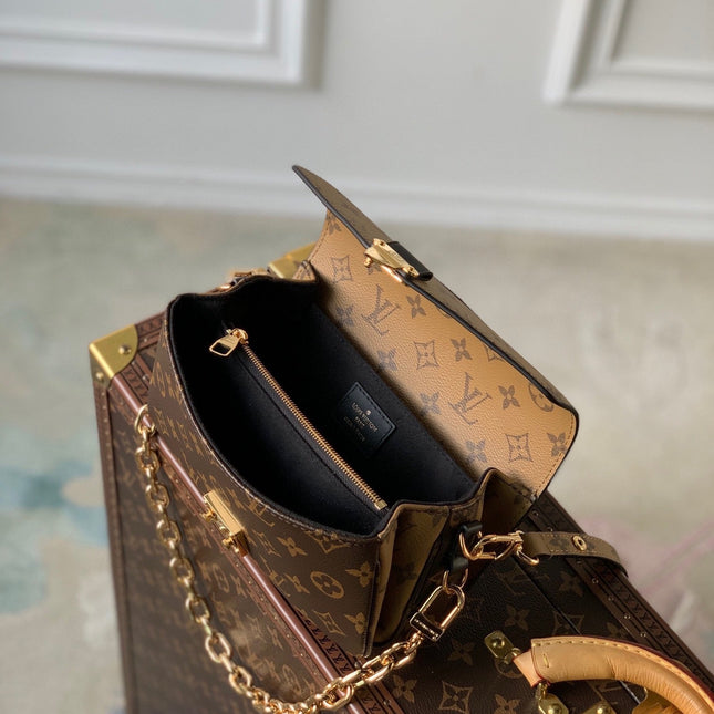 POCHETTE MÉTIS EAST WEST 21.5 IN BROWN MONOGRAM COATED CANVAS AND CALFSKIN