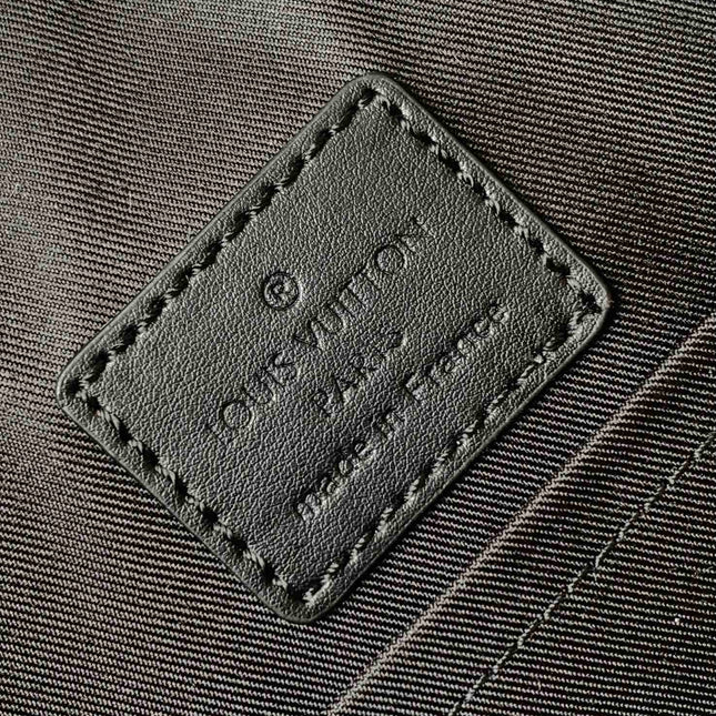 DISCOVERY BACKPACK 41 IN BLACK MONOGRAM MACASSAR CANVAS AND CALFSKIN