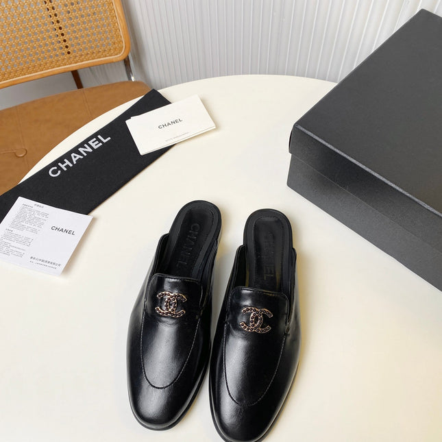 FLAT MULE IN BLACK LAMBSKIN 983818