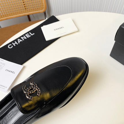 FLAT MULE IN BLACK LAMBSKIN 983818