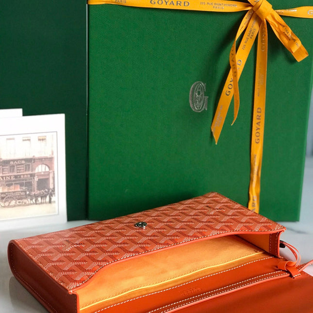 MONTE-CARLO PM CLUTCH 25 IN ORANGE GOYARDINE CANVAS