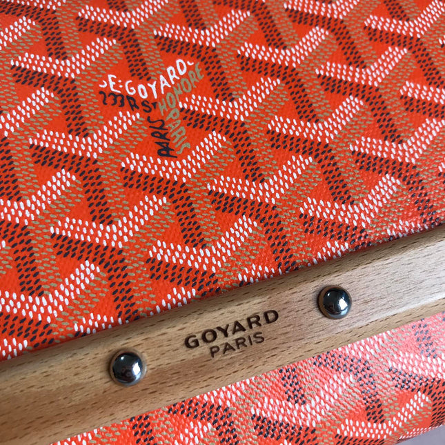 MONTE-CARLO PM CLUTCH 25 IN ORANGE GOYARDINE CANVAS