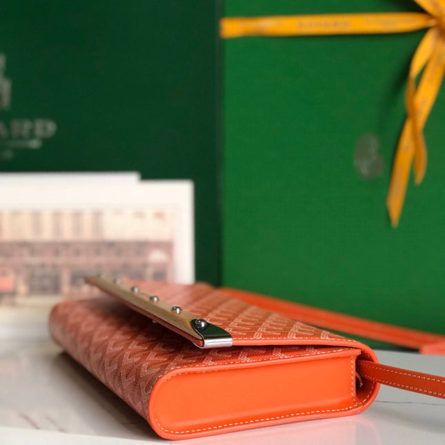 MONTE-CARLO PM CLUTCH 25 IN ORANGE GOYARDINE CANVAS