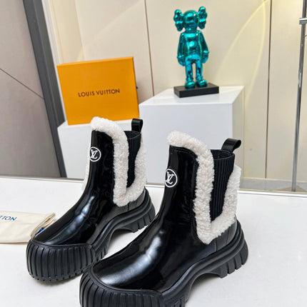 LV RUBY FLAT ANKLE BOOT IN BLACK CALFSKIN AND WHITE SHEARLING