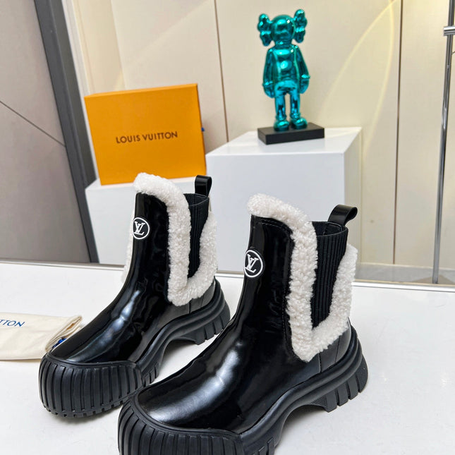 LV RUBY FLAT ANKLE BOOT IN BLACK CALFSKIN AND WHITE SHEARLING