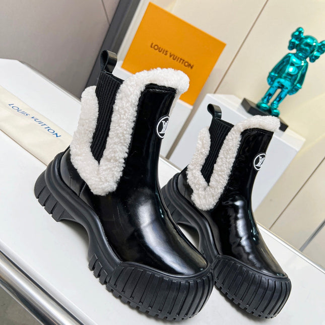 LV RUBY FLAT ANKLE BOOT IN BLACK CALFSKIN AND WHITE SHEARLING