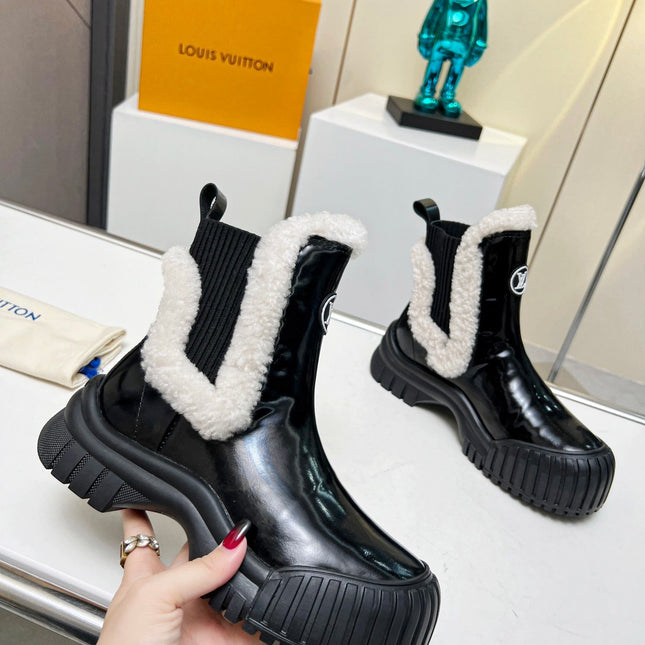 LV RUBY FLAT ANKLE BOOT IN BLACK CALFSKIN AND WHITE SHEARLING