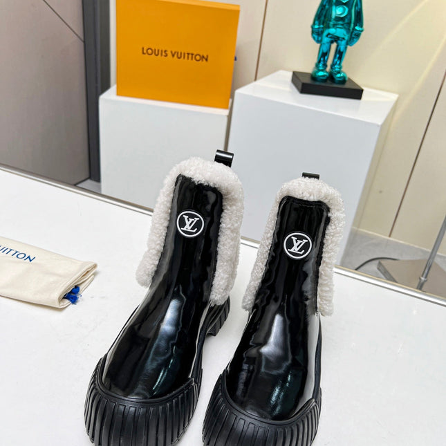 LV RUBY FLAT ANKLE BOOT IN BLACK CALFSKIN AND WHITE SHEARLING