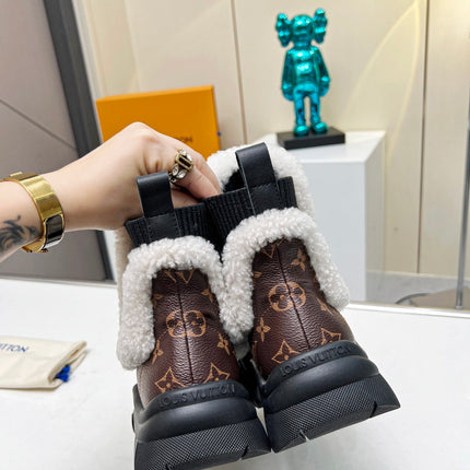 LV RUBY FLAT ANKLE BOOT IN CHOCOLATE BROWN MONOGRAM CALFSKIN AND WHITE SHEARLING