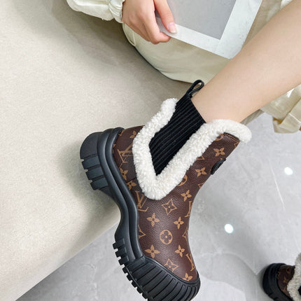 LV RUBY FLAT ANKLE BOOT IN CHOCOLATE BROWN MONOGRAM CALFSKIN AND WHITE SHEARLING