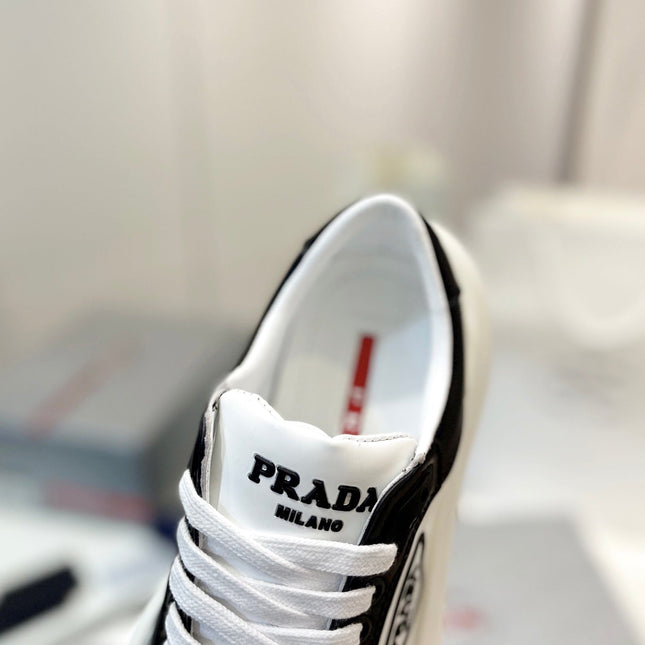 PRA DOWNTOWN THICK-SOLE SNEAKERS BLACK AND WHITE CALFSKIN