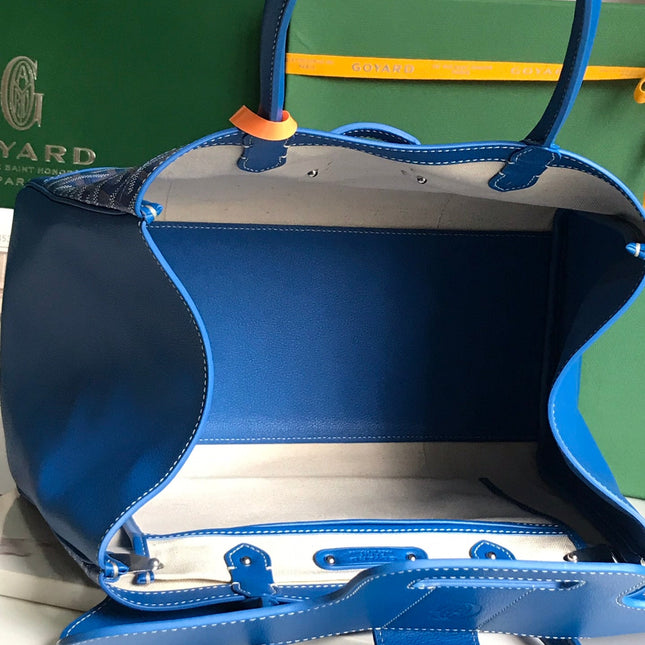SAIGON SOUPLE BAG 34 IN CURIOUS BLUE GOYARDINE CANVAS AND CALFSKIN
