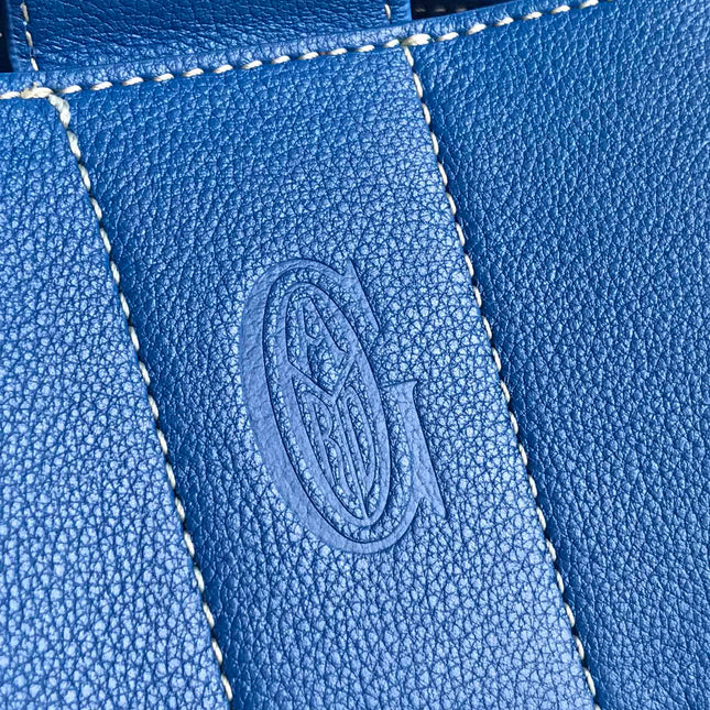 SAIGON SOUPLE BAG 34 IN CURIOUS BLUE GOYARDINE CANVAS AND CALFSKIN