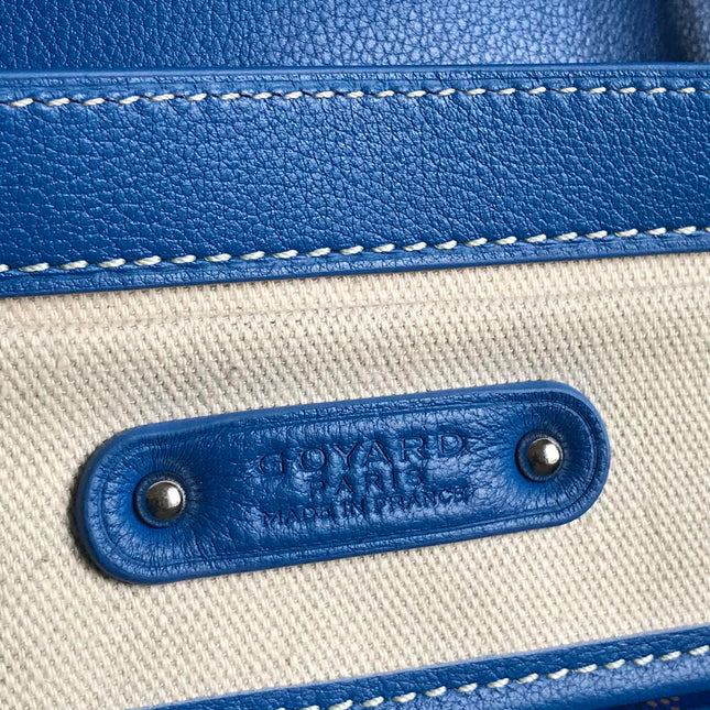 SAIGON SOUPLE BAG 34 IN CURIOUS BLUE GOYARDINE CANVAS AND CALFSKIN