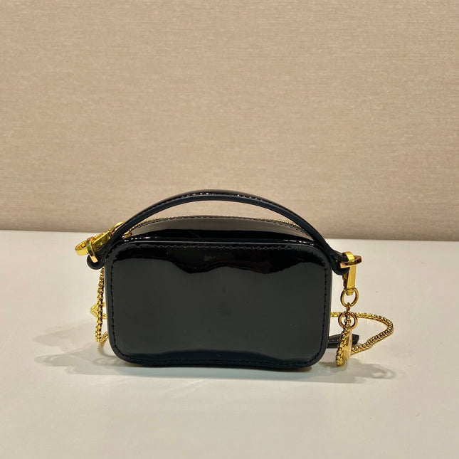MINI HAND BAG 11 WITH GOLD STRAP IN BLACK PATENT CALFSKIN