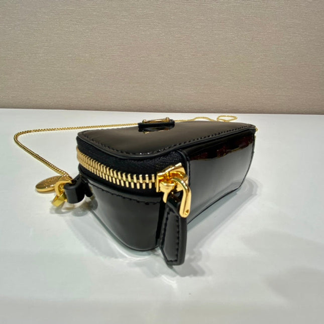 MINI HAND BAG 11 WITH GOLD STRAP IN BLACK PATENT CALFSKIN