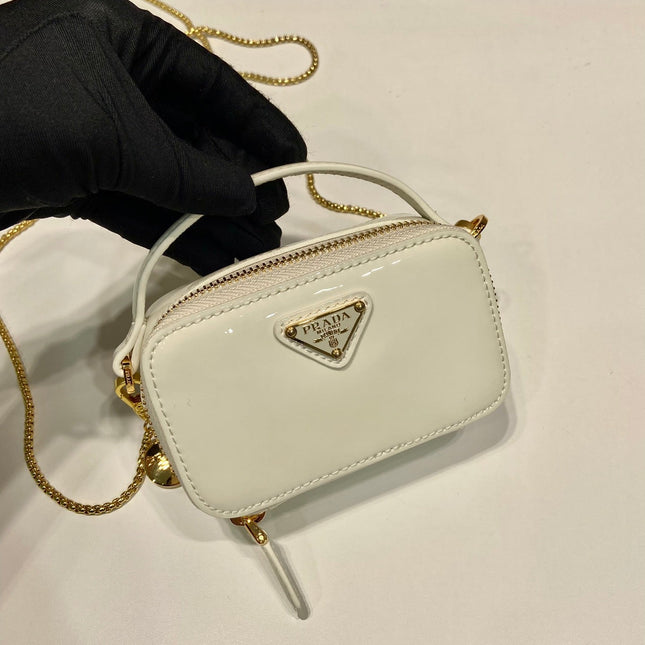 MINI HAND BAG 11 WITH GOLD STRAP IN WHITE PATENT CALFSKIN