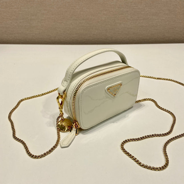 MINI HAND BAG 11 WITH GOLD STRAP IN WHITE PATENT CALFSKIN