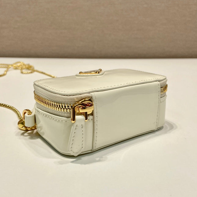 MINI HAND BAG 11 WITH GOLD STRAP IN WHITE PATENT CALFSKIN