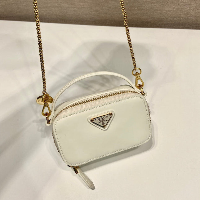 MINI HAND BAG 11 WITH GOLD STRAP IN WHITE PATENT CALFSKIN