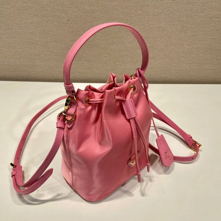 BUCKET BAG 19 IN CANDY PINK RE-NYLON AND SAFFIANO LEATHER HANDLE