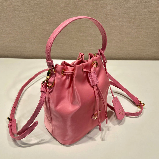 BUCKET BAG 19 IN CANDY PINK RE-NYLON AND SAFFIANO LEATHER HANDLE