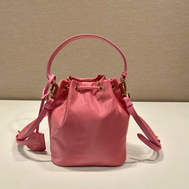 BUCKET BAG 19 IN CANDY PINK RE-NYLON AND SAFFIANO LEATHER HANDLE