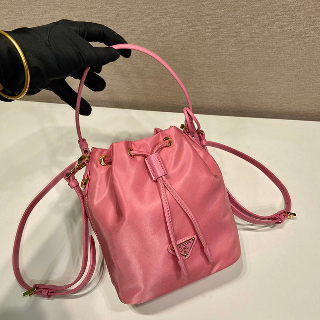 BUCKET BAG 19 IN CANDY PINK RE-NYLON AND SAFFIANO LEATHER HANDLE