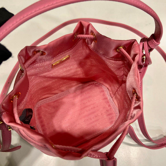 BUCKET BAG 19 IN CANDY PINK RE-NYLON AND SAFFIANO LEATHER HANDLE