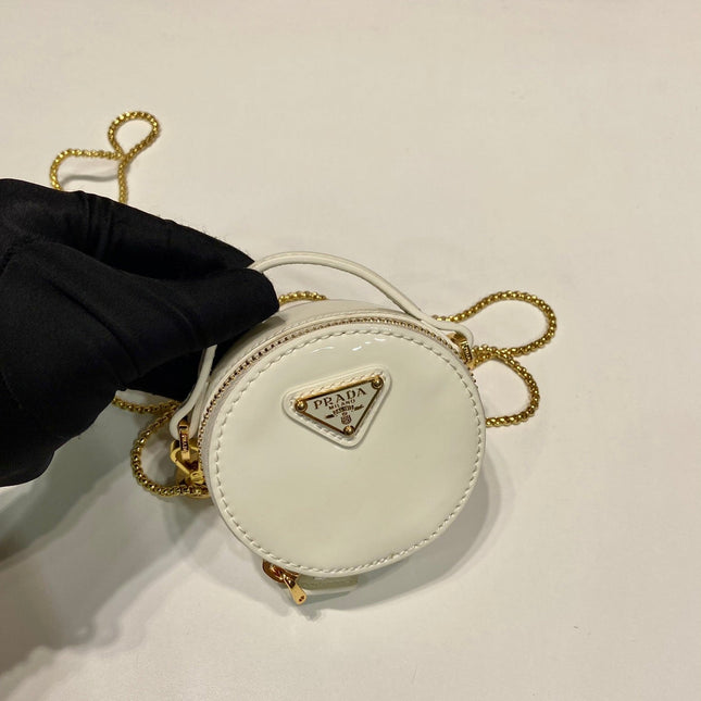 MINI ROUND BAG 8 IN WHITE GLOSSY CALFSKIN GOLD HARDWARE