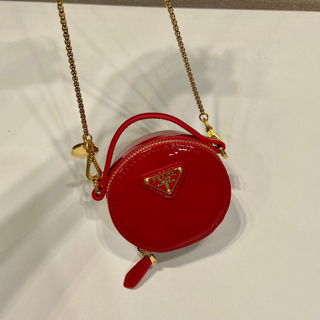 MINI ROUND BAG 8 IN RED GLOSSY CALFSKIN GOLD HARDWARE