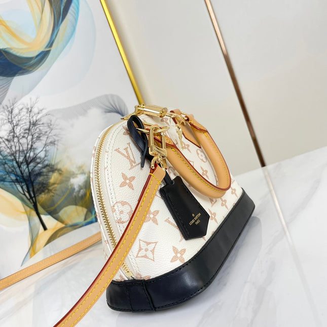 ALMA  BB 25 IN WHITE MONOGRAM DUNE CANVAS GOLD HARDWARE