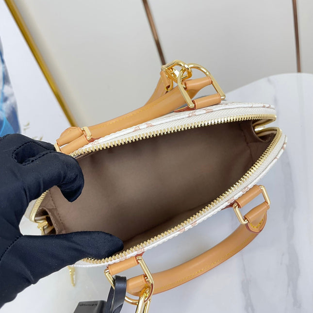 ALMA  BB 25 IN WHITE MONOGRAM DUNE CANVAS GOLD HARDWARE