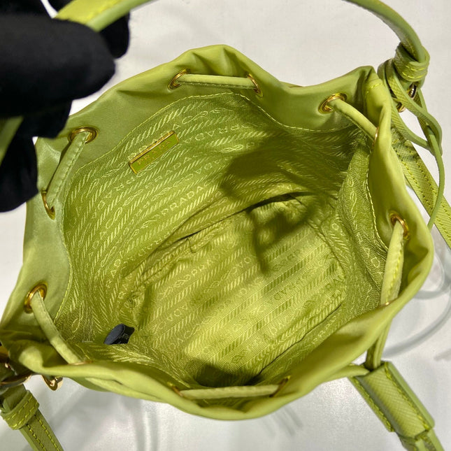 BUCKET BAG 19 IN APPLE GREEN RE-NYLON AND SAFFIANO LEATHER HANDLE