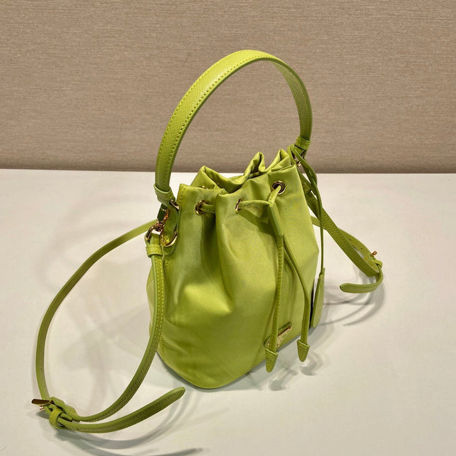 BUCKET BAG 19 IN APPLE GREEN RE-NYLON AND SAFFIANO LEATHER HANDLE