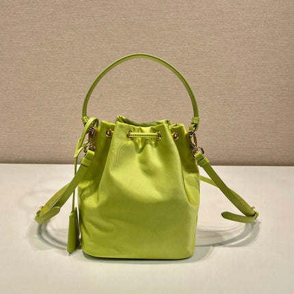 BUCKET BAG 19 IN APPLE GREEN RE-NYLON AND SAFFIANO LEATHER HANDLE