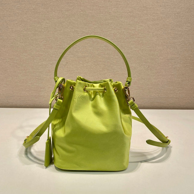 BUCKET BAG 19 IN APPLE GREEN RE-NYLON AND SAFFIANO LEATHER HANDLE