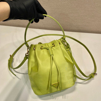BUCKET BAG 19 IN APPLE GREEN RE-NYLON AND SAFFIANO LEATHER HANDLE