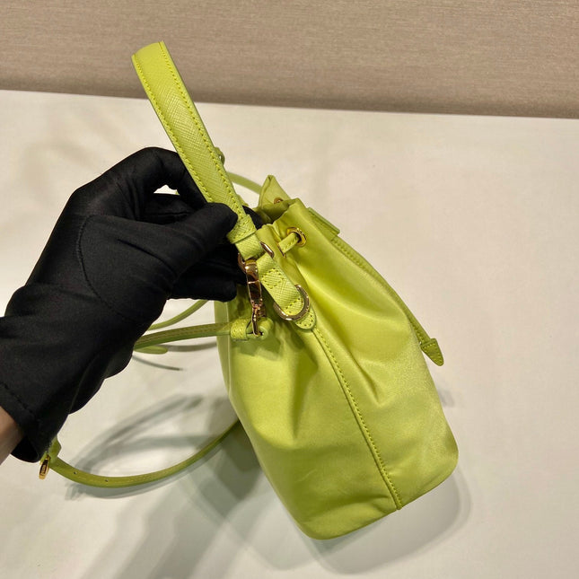 BUCKET BAG 19 IN APPLE GREEN RE-NYLON AND SAFFIANO LEATHER HANDLE