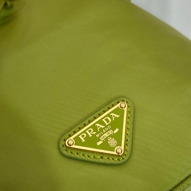 BUCKET BAG 19 IN APPLE GREEN RE-NYLON AND SAFFIANO LEATHER HANDLE