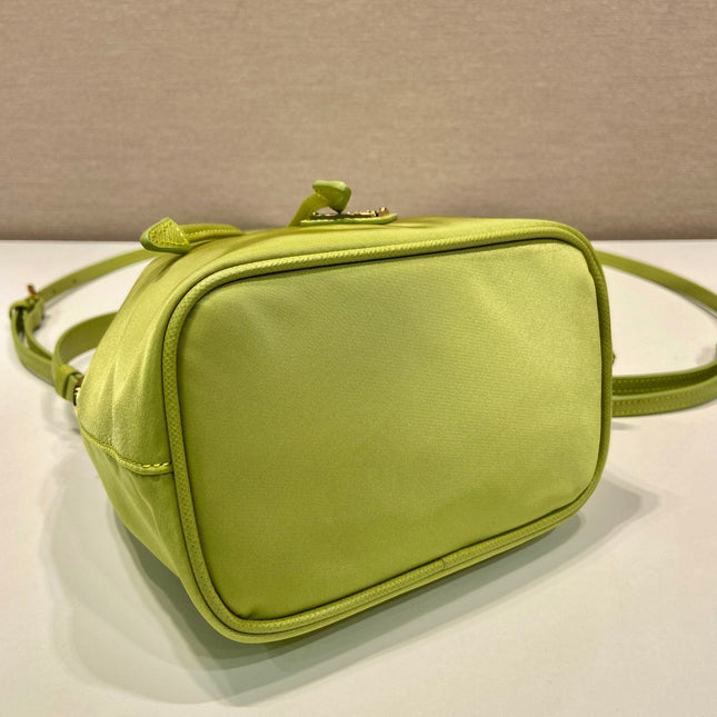 BUCKET BAG 19 IN APPLE GREEN RE-NYLON AND SAFFIANO LEATHER HANDLE